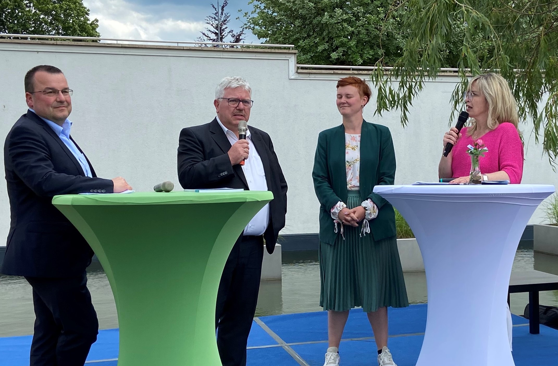 Teilnehmer auf dem Podium